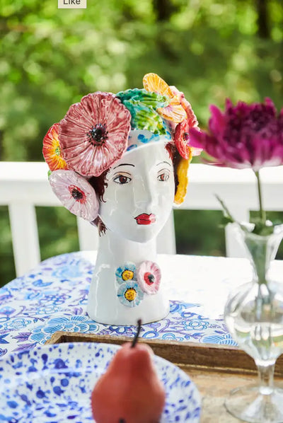 Vase tête en céramique, fleurs